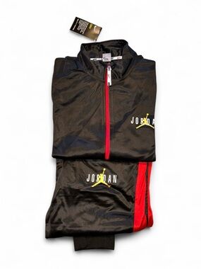Nike Black Track Jacket with Red Zipper and Yellow Jumpman